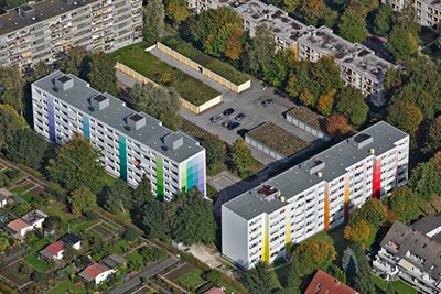Orange sanierte Fassade am Ordalweg in Dortmund-Brackel